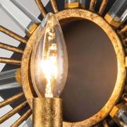 Wandlamp Sun King, afwerking in goudkleurige folie